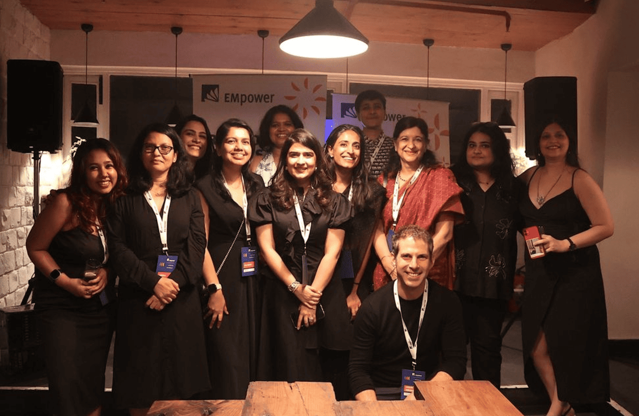 A group of diverse EMpower employees